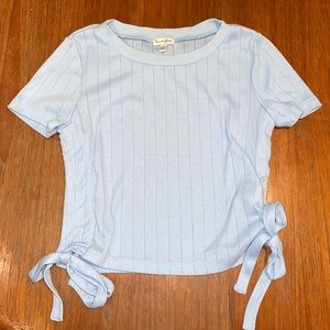 Blue cropped shirt with bows